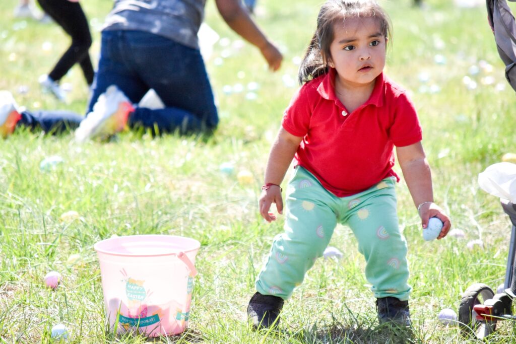 little girl at an Easter Egg Hunt